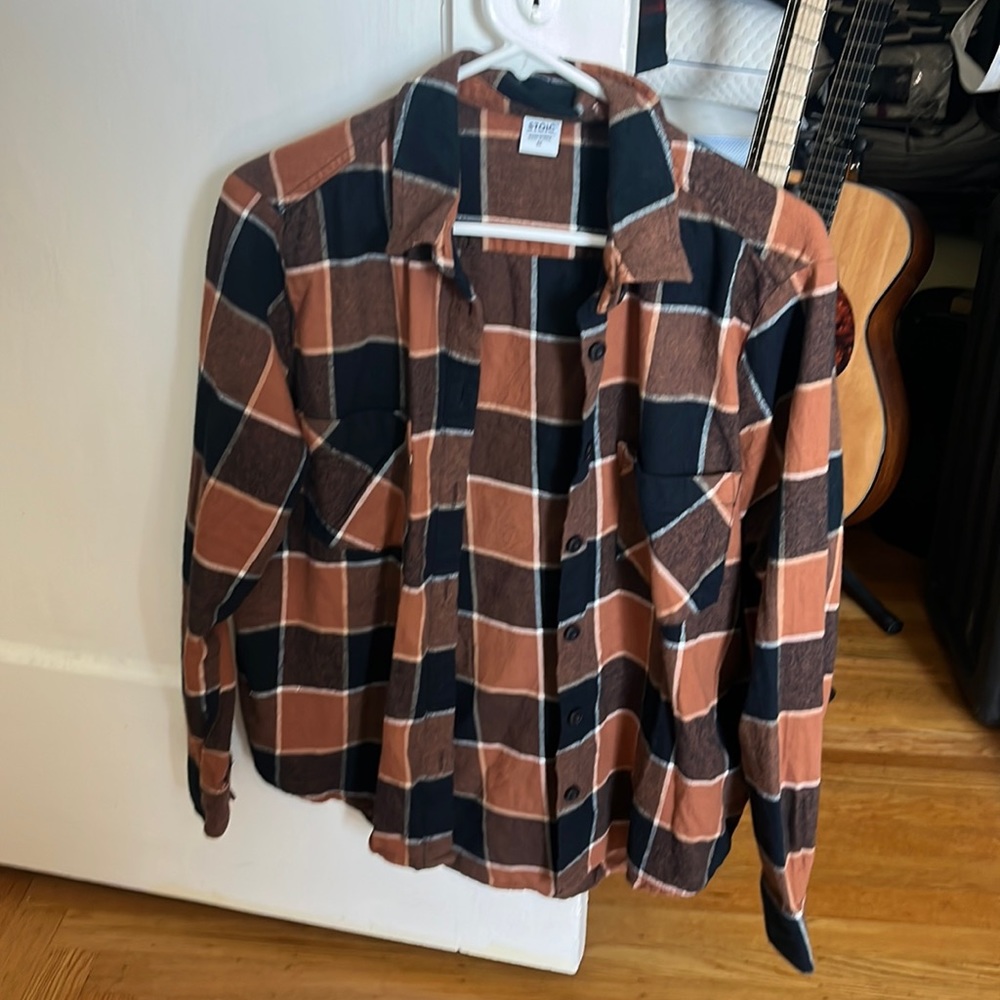 Brown and black stoic brand plaid